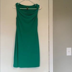 Green boat neck cocktail dress.